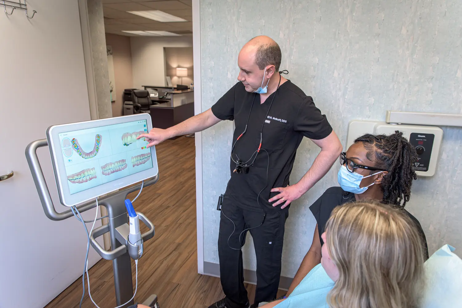 Dr. Wolkoff reviewing a treatment plan with a patient